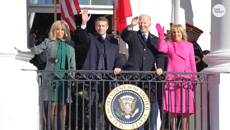 France’s President Emmanuel Macron is welcomed at the White House Thursday during a ceremony before Biden's first state dinner.