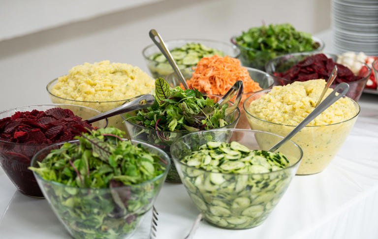 Various salads are served at a buffet during a corporate event. Silas Stein/picture alliance via Getty Images