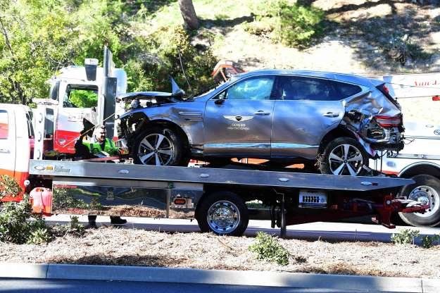 Slide 9 of 9: A tow truck recovers the vehicle driven by golfer Tiger Woods in Rancho Palos Verdes, California, on Feb. 23, 2021.
