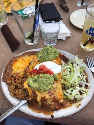 Slide 9 of 31: - Rating: 4.0/5 (306 reviews) - Detailed ratings: Food (4.0/5), Service (4.0/5), Value (4.0/5), Atmosphere (4.0/5) - Category: Mexican, Southwestern - Price: $$ - $$$ - Address: 4144 E Indian School Rd, Phoenix, AZ 85018-5313 - Read more on Tripadvisor