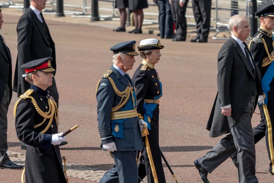 King Charles III, center left; his sister, Princess Anne, center; and his brother, Prince Andrew, right, walk behind the coffin of their mother, Queen Elizabeth II, in London on Wednesday, Sept. 14, 2022. (Andrew Testa/The New York Times)