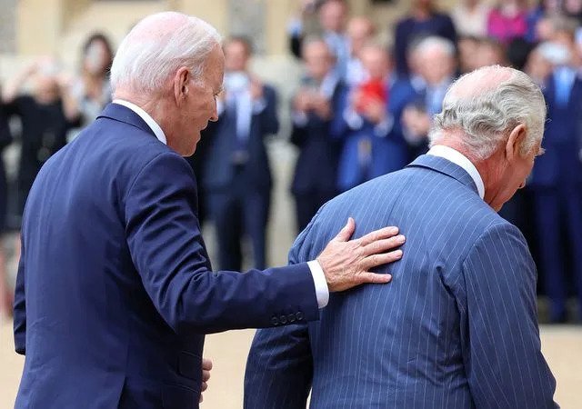 &lt;p&gt;CHRIS JACKSON/POOL/AFP via Getty&lt;/p&gt; President Joe Biden puts his hand on King Charles at Windsor Castle on July 10