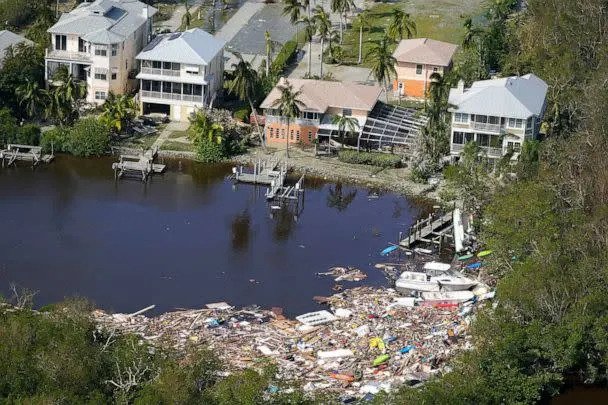 PHOTO: This aerial photo shows damaged homes and debris in the aftermath of Hurricane Ian, Sept. 29, 2022, in Fort Myers, Fla.  (Wilfredo Lee/AP)