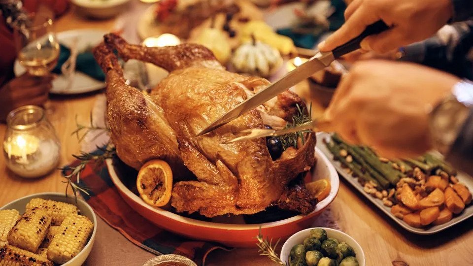 Don't blame the turkey for your post-meal sleepiness, experts say. - Adobe Stock