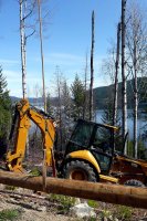Descopera eficienta buldoexcavatoarelor in proiectele de amenajare a terenului!